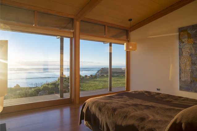 The master bedroom looks out over Tasman Bay. 
