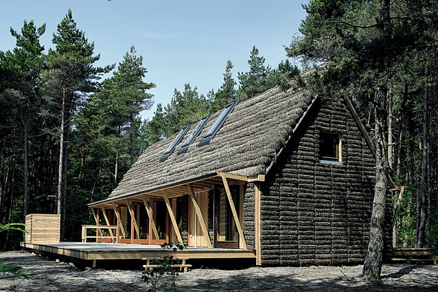 Seaweed house, Denmark. Designed by  Vandkunsten architects in 2013. This holiday house was made with old construction techniques, including seaweed cladding.