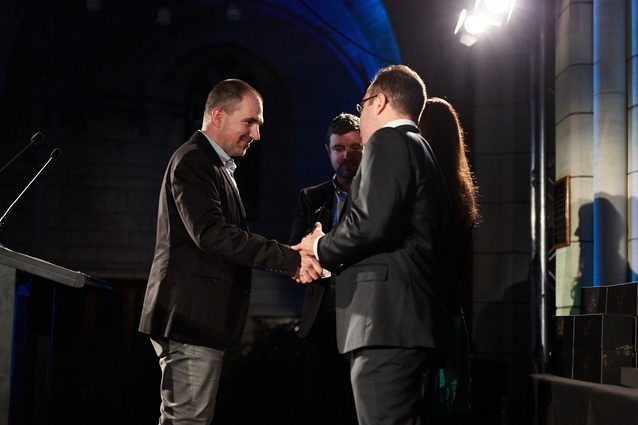 Severin Soder from Architectus receiving the Civic Award for Christchurch Bus Interchange.