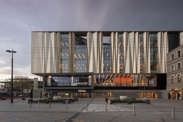 The south face of Tūranga shows the expressed public event space in its black box, the main ‘active’ floor with its additional ceiling height at the first-floor level and the low-key public entrance on the ground floor.