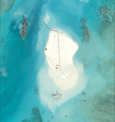 Johnson South Reef, photographed in January 2014. Before dredging the only structure here was a small concrete platform that housed a communications facility, garrison building and pier.