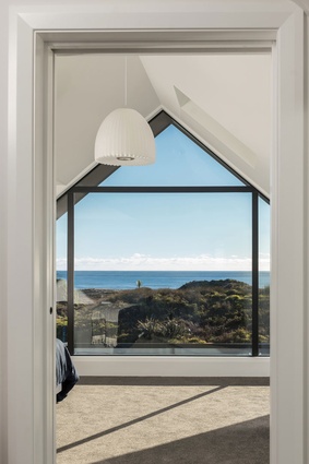 Papamoa Beach House. Third-floor bedroom with a stunning sea view.