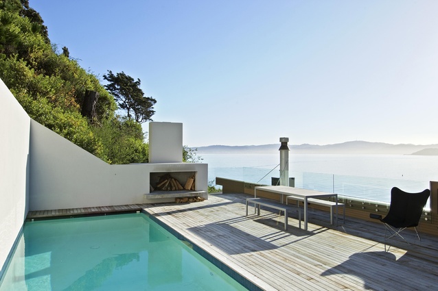 The rooftop swimming pool offers secluded entertainment with wide-ranging views of the bay towards Wellington. 