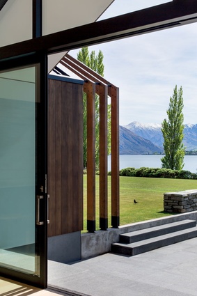 Shading screens from shaped cedar battens add mass to the elevation and match the cladding.