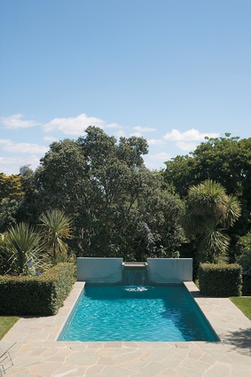 Looking north over the pool at the rear of the inner Auckland house designed by Peter Sargisson.