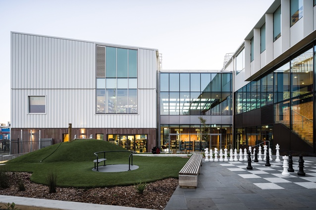 The playground, located in the shelter of the building’s form.

