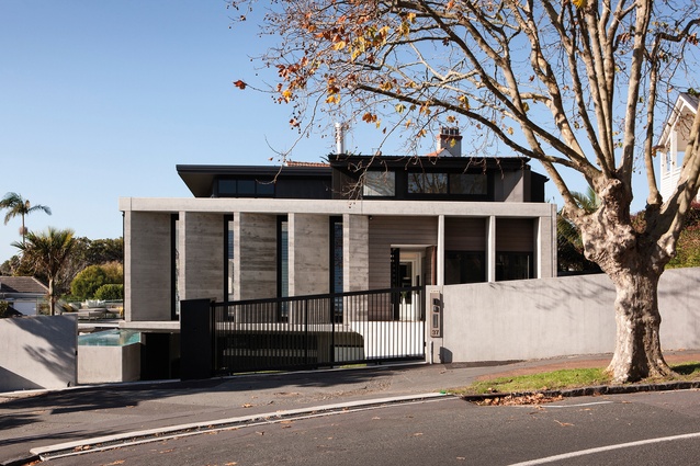 Herne Bay House: A traditional villa verandah is re-imagined with a series of weatherboard-impressed concrete fins.