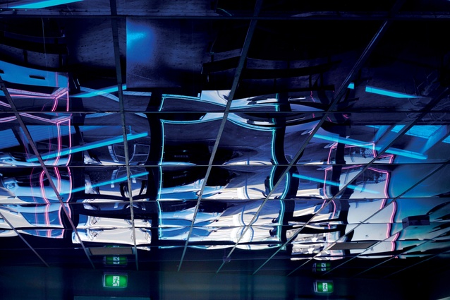 Electric blue perspex on the ceiling is used to create futuristic ambient reflections.