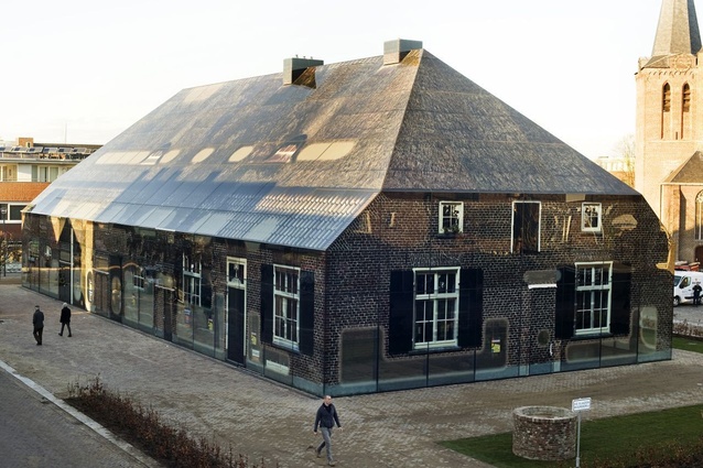 The Glass Farm in Schijndel, The Netherlands. Designed by MVRDV, the upscaled image of a traditional farm house was printed using a fritted procedure onto the glass façade.