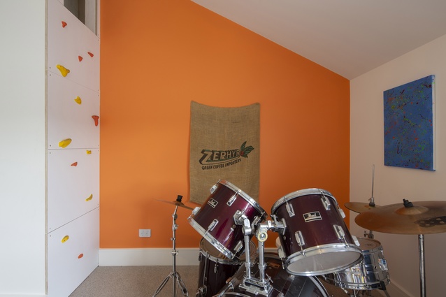 The children’s bedrooms feature climbing walls that access a crawlspace connecting the
two rooms.