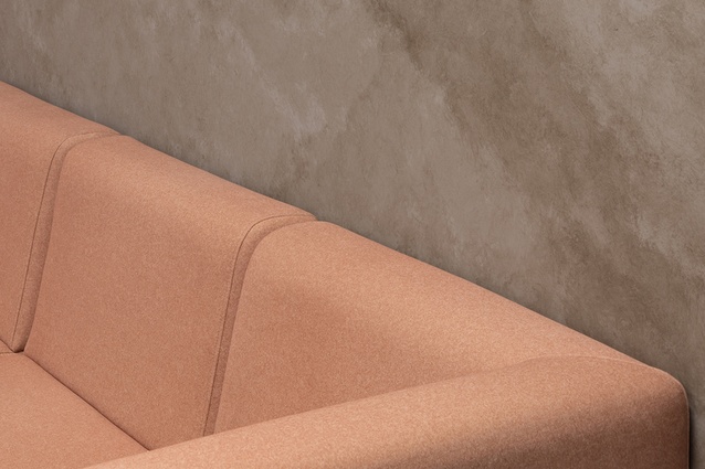 Communal areas in the 12th-floor space feature high-quality fabrics and finishes. 