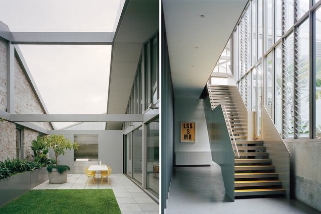 The terrace was formed by removing part of the original roof; a yellow poster print by Studio Boot hangs downstairs.     