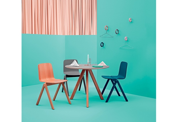 Design Junction: Gymnast-inspired coat or towel hooks in mint, coral or grey, by Hay at Lost and Found. The Hay Copenhague table and chairs are designed by Ronan and Erwan Bouroullec.