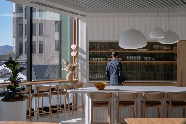 Large windows in the staff kitchen for workers to immerse themselves in the Cathedral Square outside.