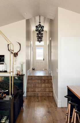 The light pendants in the hallway were ordered online from Restoration Hardware in the US.