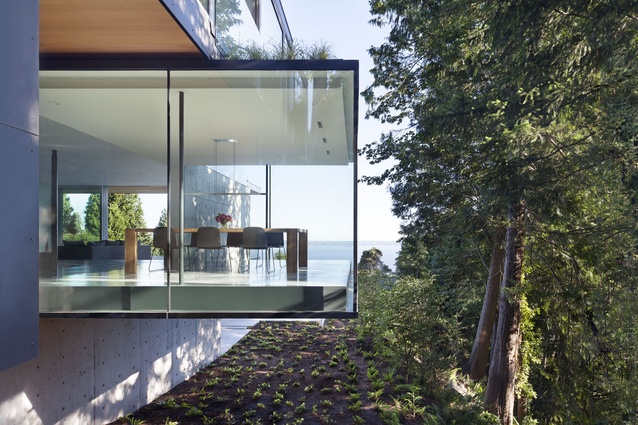 The cantilevered dining room makes indoor dining feel al fresco. 