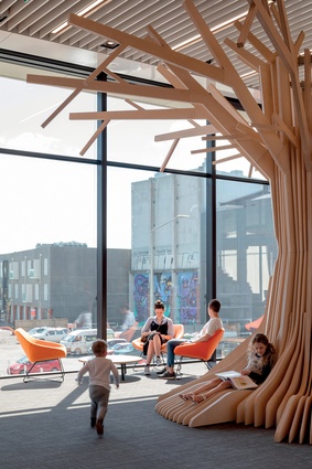 The children’s area features a wooden tree, designed and built by 360 Interiors.