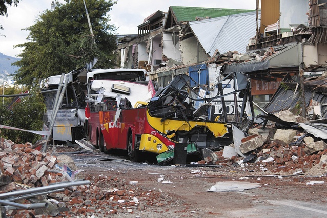 On 22 February 2011 Ann Brower was sitting in this red bus when the façade of 603 and 605–613 Colombo Street collapsed, killing eight passengers and four pedestrians.