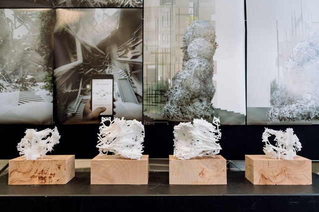 Models of Zuo (Jack) Guo's project show a cut-through of the bricolage structure.