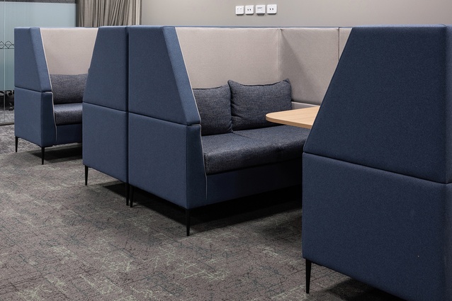 Meeting booths feature Warwick fabric: Akito Ocean.