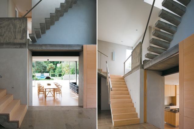 Looking from the house over the north-facing terrace to the pool. The sculptural concrete stairs over the circulation space lead to a loft-study; stairways leading from and perched above the ground floor entry area.