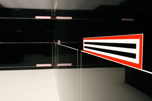 The installation's glossy black panels were fabricated in New Zealand and shipped to Venice.