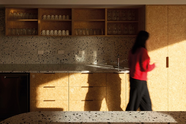Staff facilities are spartan, in keeping with the cardboard box aesthetic of the storage racks.