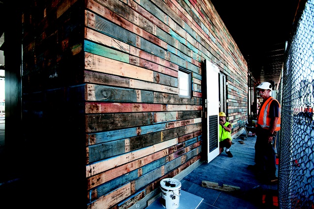 Old packing pallets were used on walls to reflect heritage.