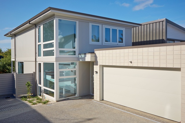The staircase of this Newell Street subdivision in Auckland appears to float within a lantern-like structure. 