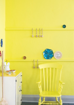 Farrow & Ball’s Yellowcake on this kitchen wall adds interest to rooms dominated by chrome or white appliances. Similar citrus yellows are Resene’s Headlights and Dulux’s Fort Street.