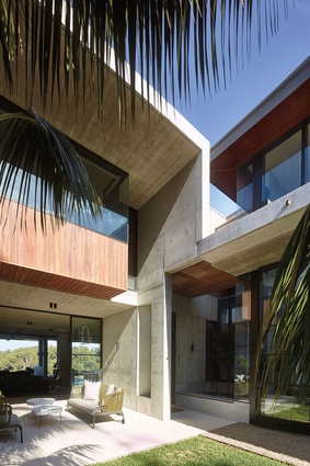 Mosman House has a sense of transparency, allowing views of the water through the house.
