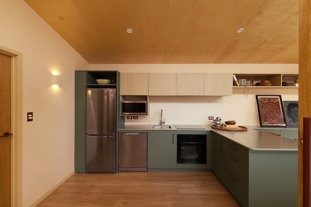 The kitchen provides colour contrast for good visibility and definition as well as rounded corners to be dementia friendly.