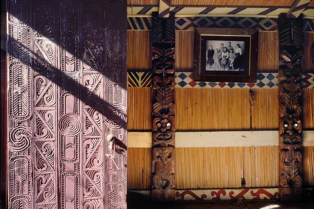 The interior of whare Rangikurukuru: evident are the carvings by Jane Tōpia.