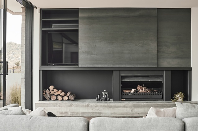 The dark and light spectrums of the neutral palette are juxtaposed throughout the interior.
