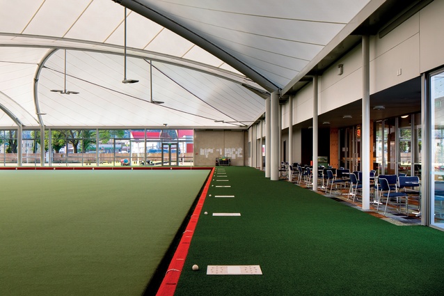 The bar and spectator areas overlook the Super Turf-clad bowling rink.
