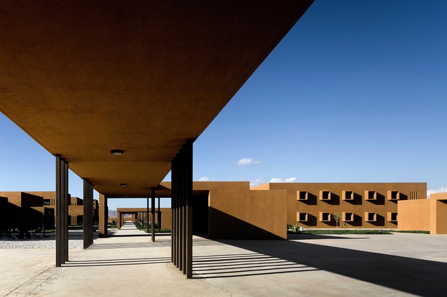 Guelmim School of Technology, Morocco. Principally rough-rendered reinforced concrete, the buildings are linked by courtyards and walkways with metal and timber elements.