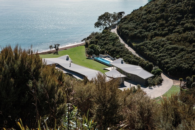In the Bay of Islands, the steep topography reinforces three separate buildings to create the seaward-orientated encampment.