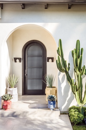 The stoneware and glazed planters at the front door are from the Hex collection by BZippy & Co.