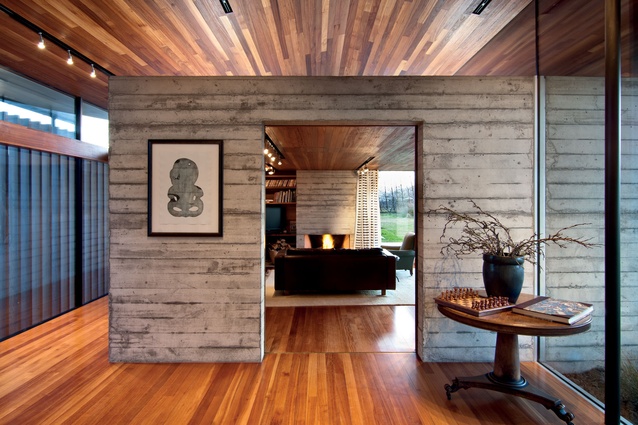 Architect Gerald Parsonson has employed a material palette of concrete and timber both externally and internally.