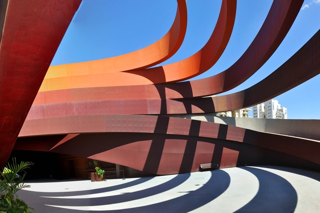Design Museum Holon, Israel. The architects have created a tension between an internal arrangement of efficient box-like spaces, and the dynamic, curvaceous external envelope.
