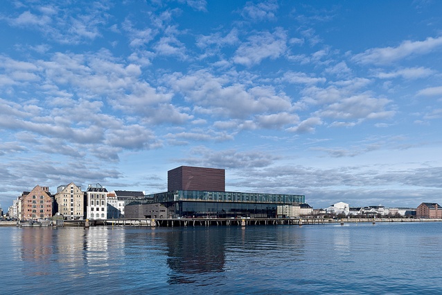 The Royal Danish Theatre Playhouse is located at the edge of Copenhagen. Its oak board promenade sits above the quayside and accesses the large public foyer of the theatre.