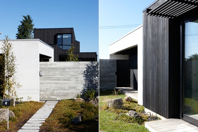 A mix of materials and volumes helps break up the home's street frontage and hints at the complexity of the internal architecture. 