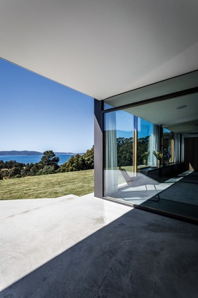 External living spaces offer shelter from the wind while embracing the sun.