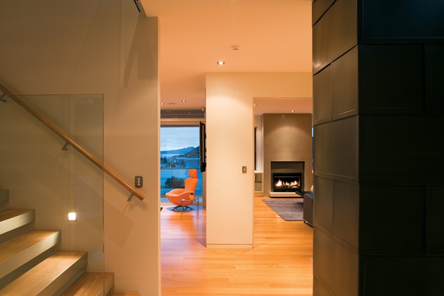 Looking into the living and sitting rooms, and out to Auckland’s iconic Rangitoto Island. 