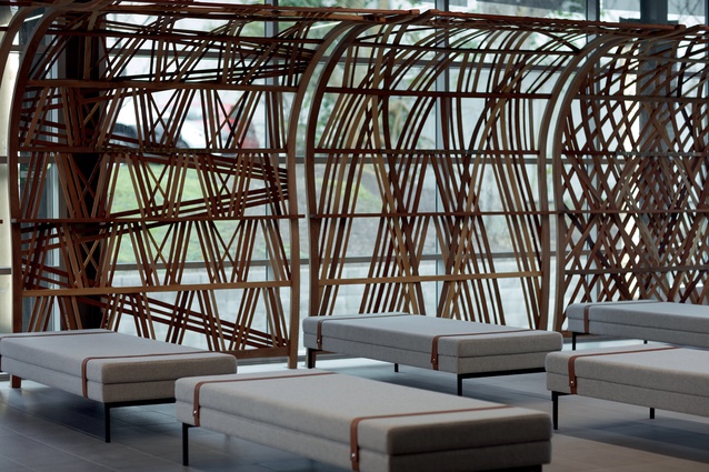 The woven sculpture made from native timber in the reception area reflects the patterns of tukutuku panels.