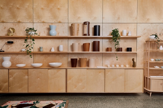 The birch ply accentuates the design objects on display without battling for attention.