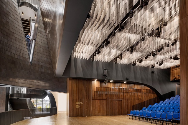 Studio Bell, Canada by AWA Architecture. Sinuous curves recall various musical instruments, while the concert hall can be closed for performances or fully opened, allowing music to waft through the lobby.