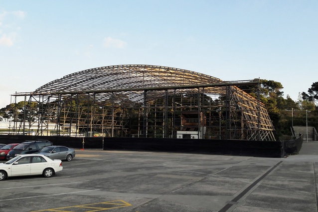he original Sunderland hangar's bowstring roof stripped back to expose its remarkably slender structural steelwork: curved rolled steel joist top chords and bolted-up angles of pre-World War II British steel.