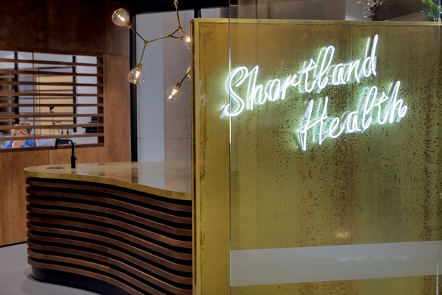 The neon Shortland Health ‘shop frontage’ sign marks a departure from the typical medical centre.