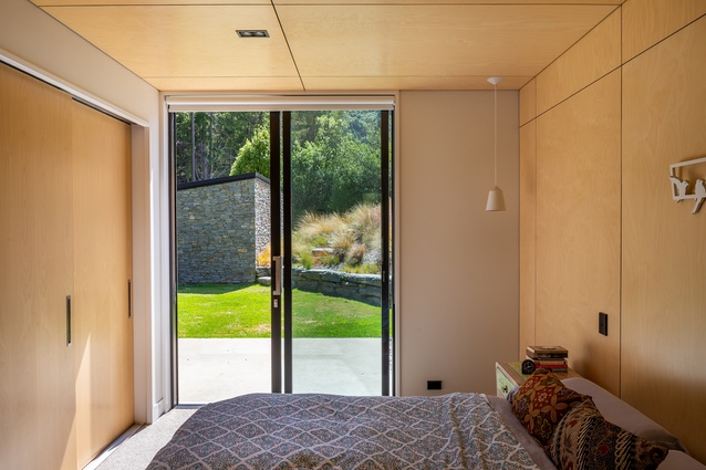 The bedrooms and the homeowner’s creative studio upstairs are lined in birch ply.